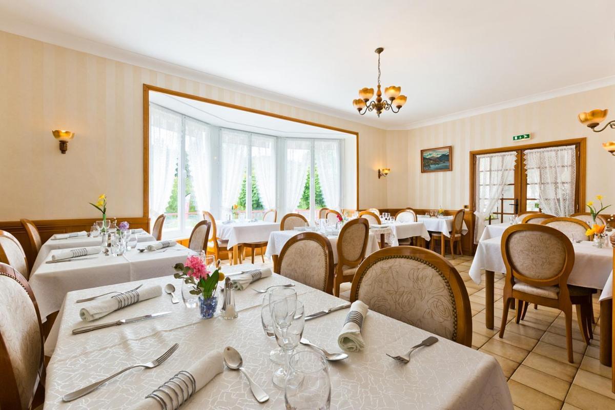 Hotel Restaurant Le Grillon Chambon-sur-Lac Exterior photo